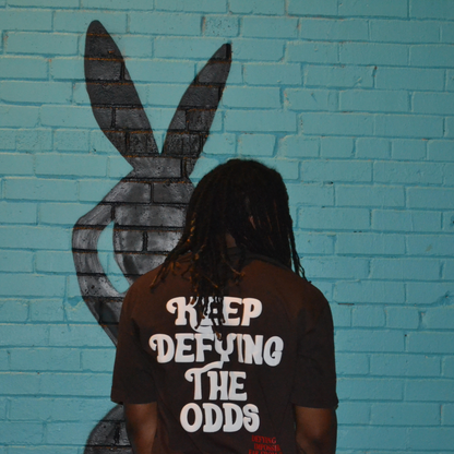 "Keep Defying The Odds" Tee (Brown)